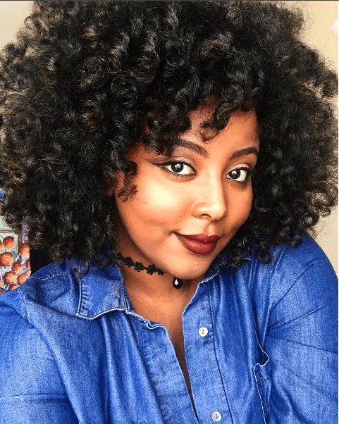 stylish space buns twist out ig journeytowaistlength naturalhairmag