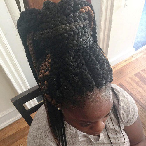 big box braids in a chunky high ponytail