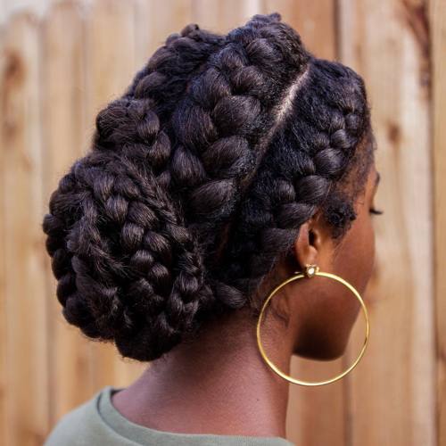 black bun updo with goddess braids