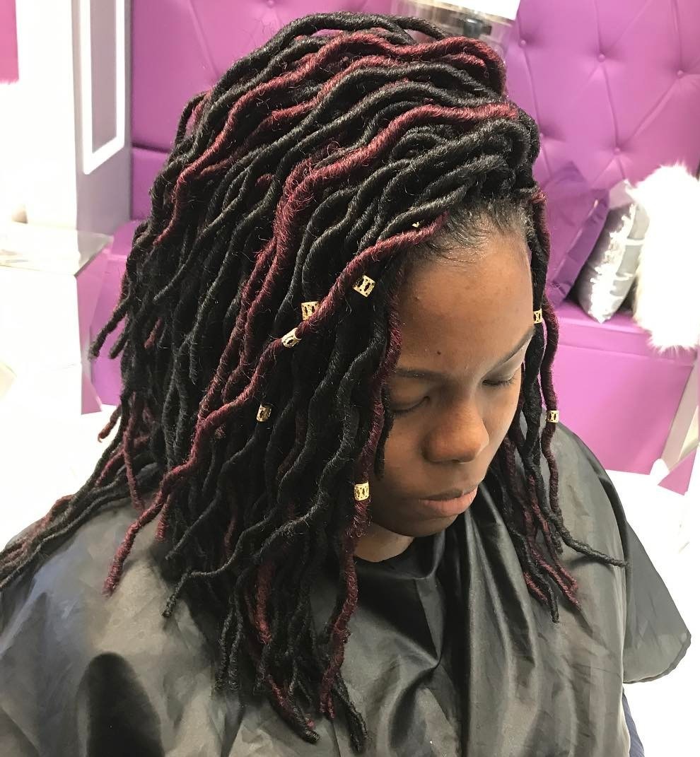 Wavy Faux Locs With Highlights