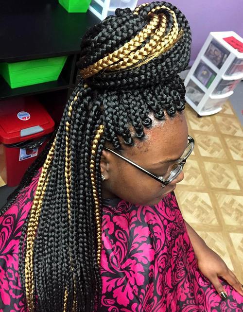 bun half updo for highlighted box braids