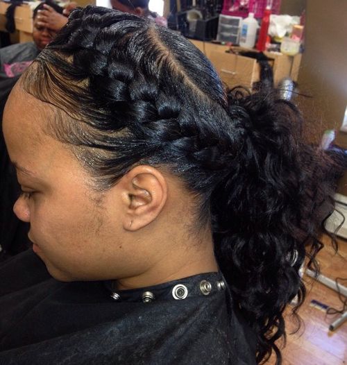 headband braid and a curly pony black hairstyle