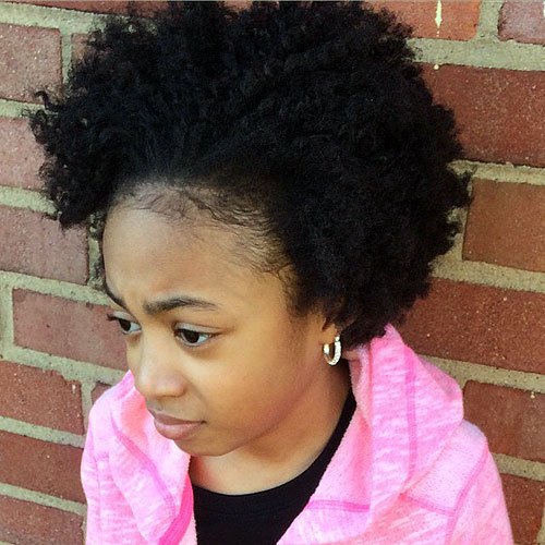 black girl's short natural hairstyle