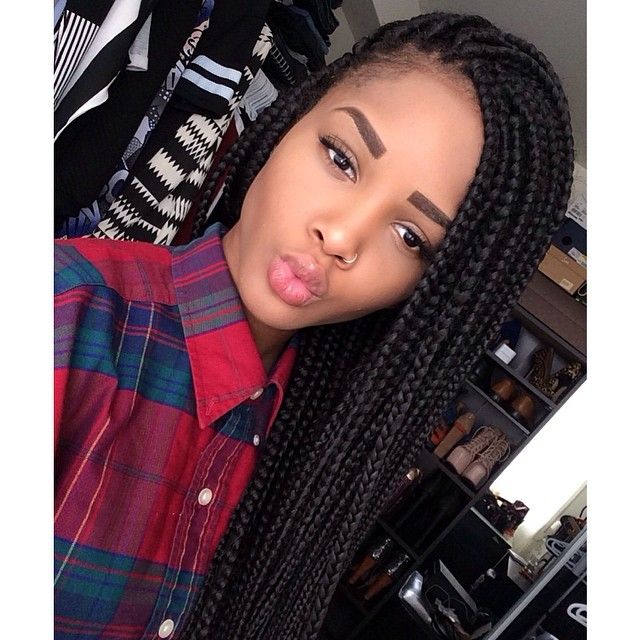 short box braids a look thats coming back. that phone though not so much lol