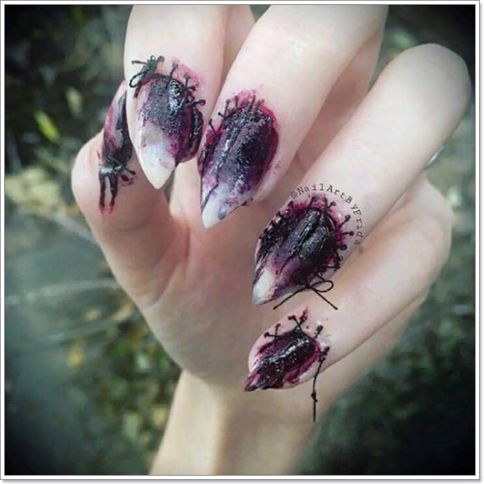1582543775 576 105 Glitzy Halloween Nails to Rock Your Party Looks