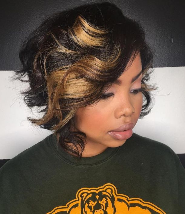 17 black curly bob with chunky highlights