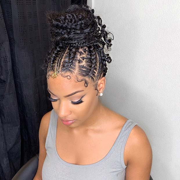 High Braided Bun with Curls and a Gold Accessory