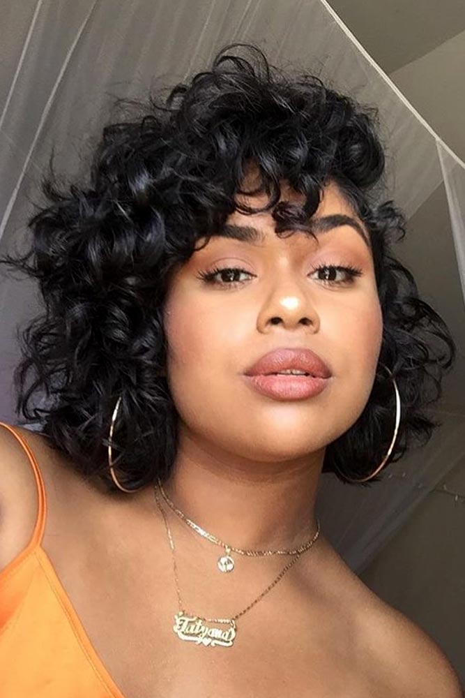 bob hairstyles for black women side parted curly bangs layered