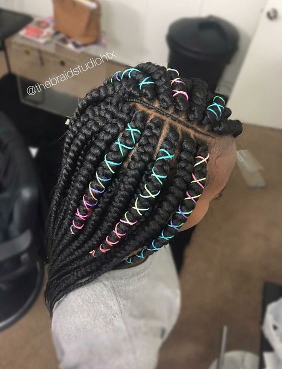 chunky box braids with colorful strings