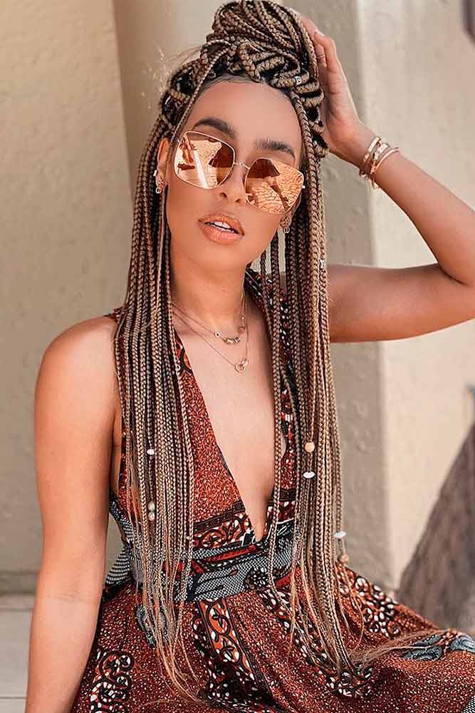 cornrows hairstyles long top knot