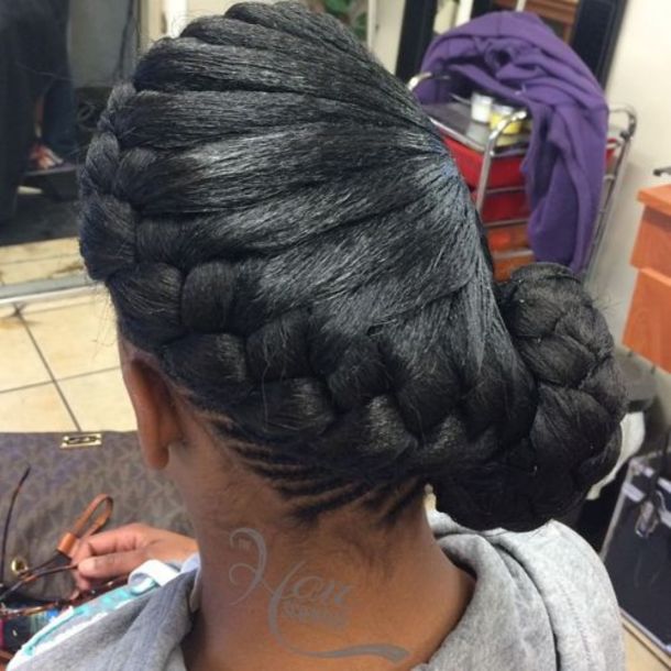 13 black asymmetrical side braided bun updo