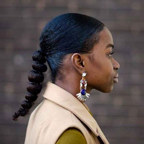 Our moment to channel Sade has finally arrived thanks to this knotted low ponytail