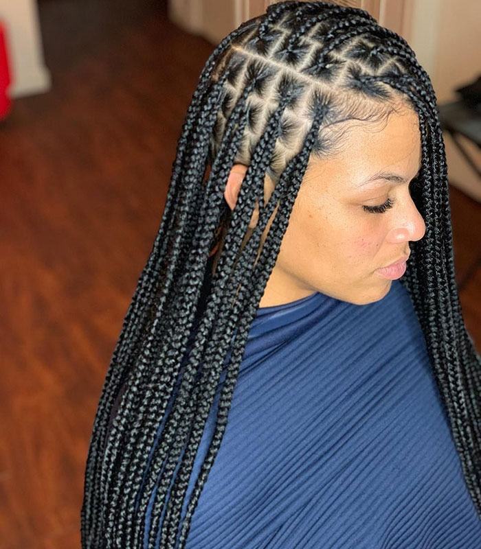 woman with long box braids 1