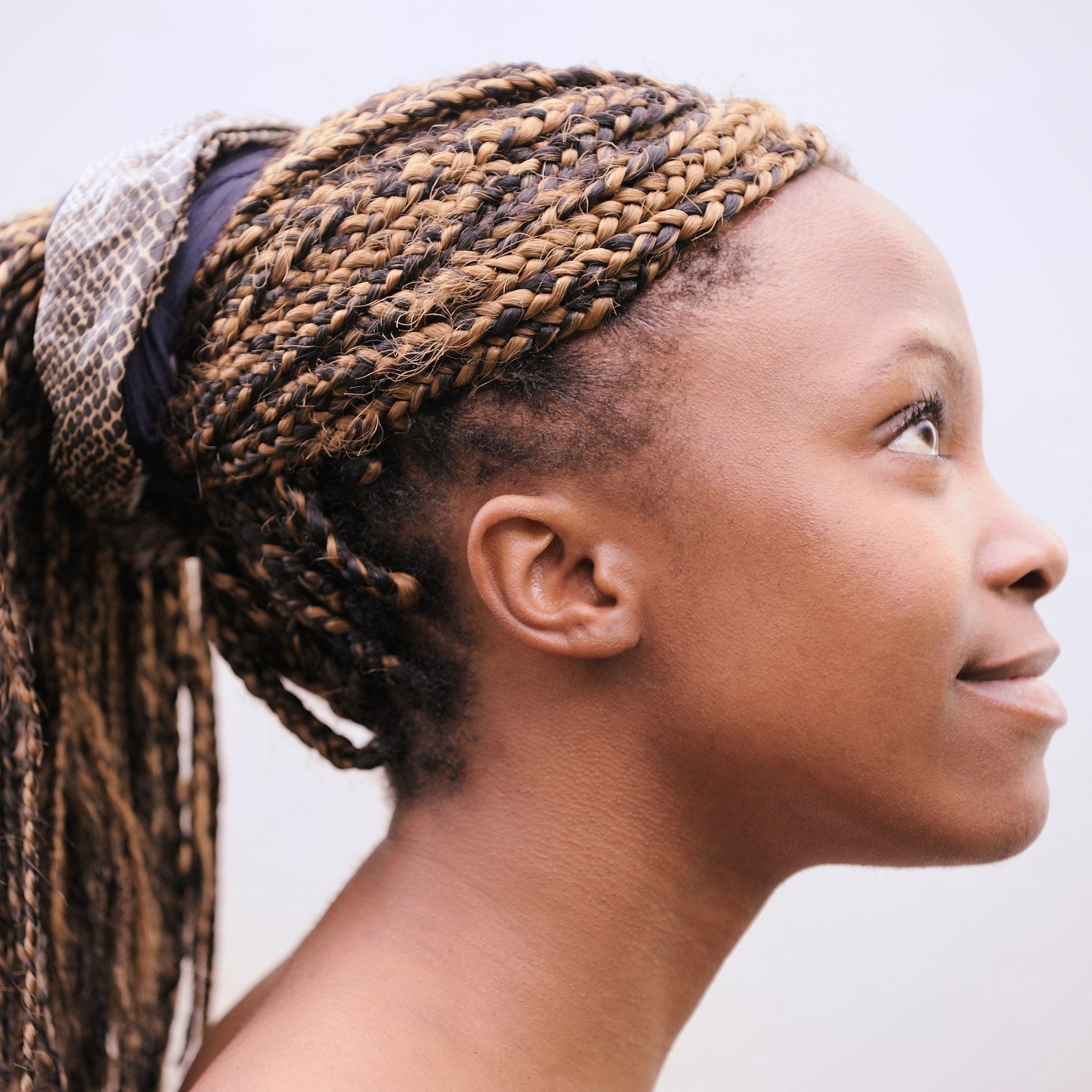 side profile of woman with box braids result