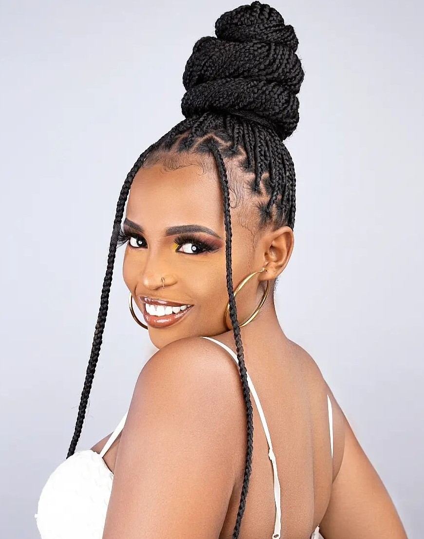 1 small box braids styled into three layer bun