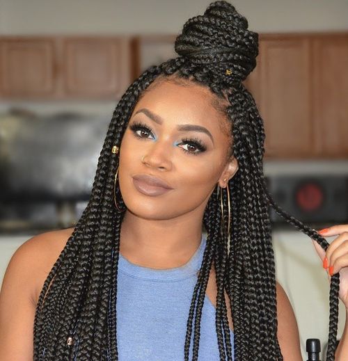 17 box braids in a half bun