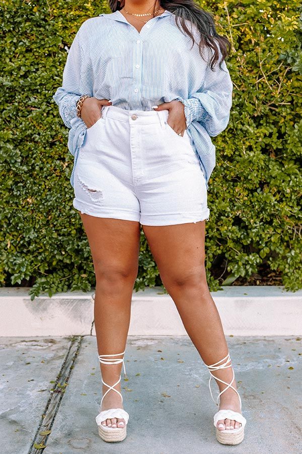 The adorable white plus size Mel shorts feature y