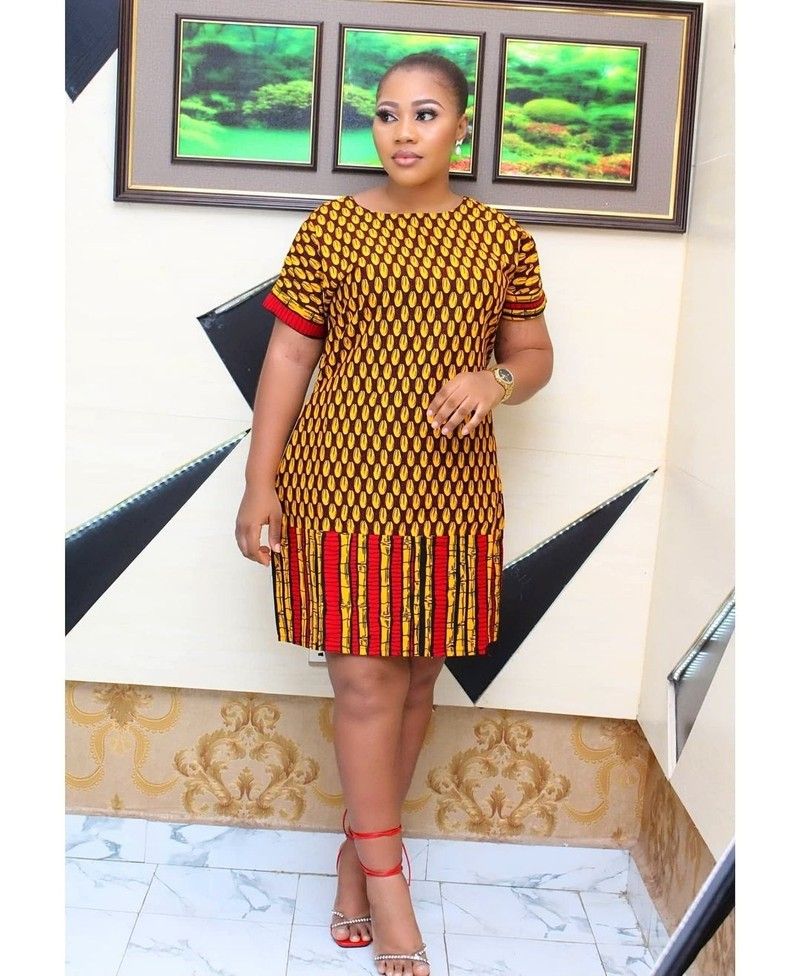 This contains an image of 2 tone ankara dress