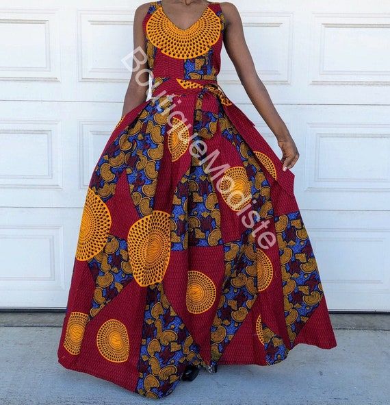 This contains an image of African print Dress yyth