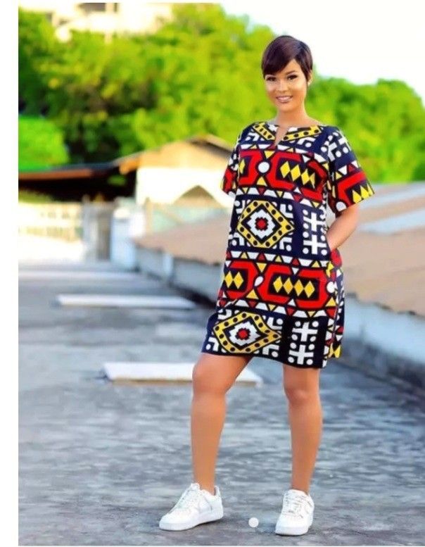 This contains an image of African print dress yyt