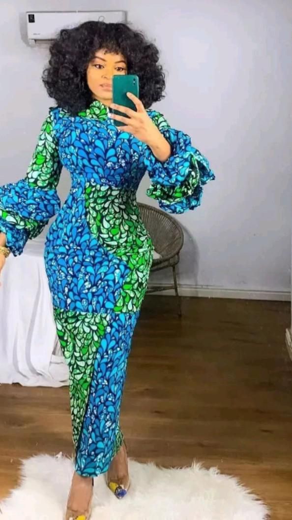 This contains an image of Long Ankara dress yythkg