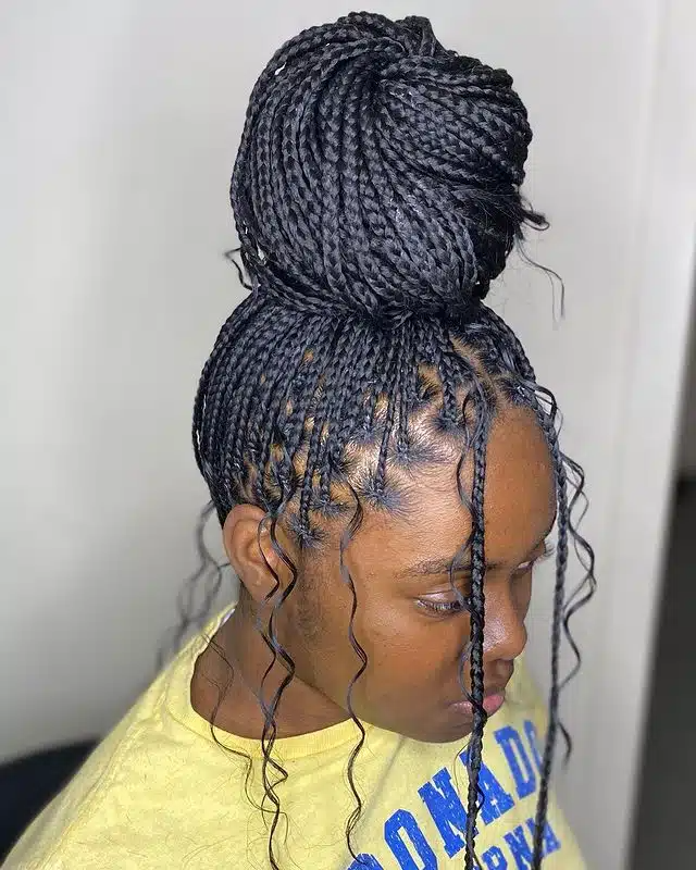 Small Black Bohemian Box Braids With High Bun.jpg