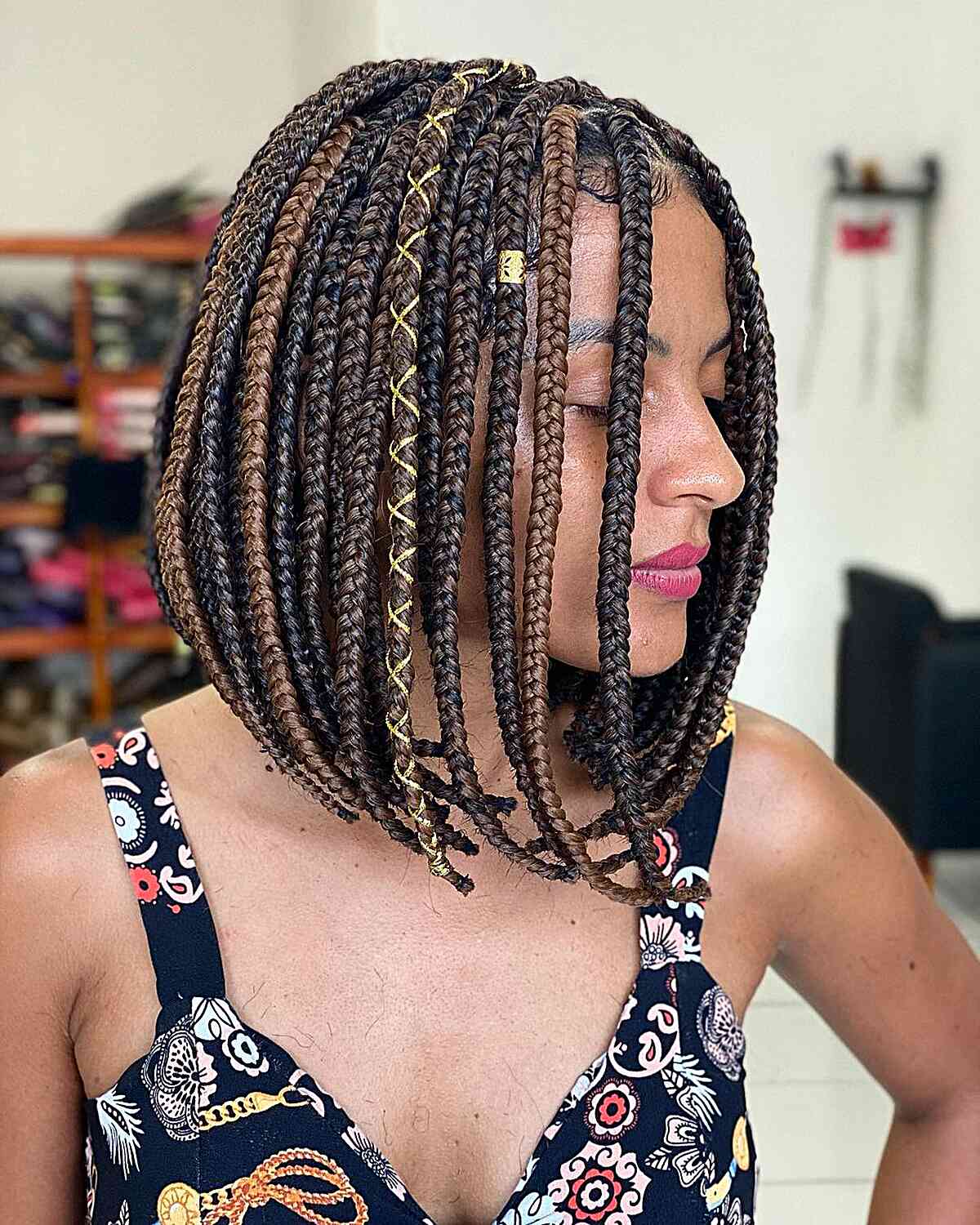 chunky box braids with ribbon accents