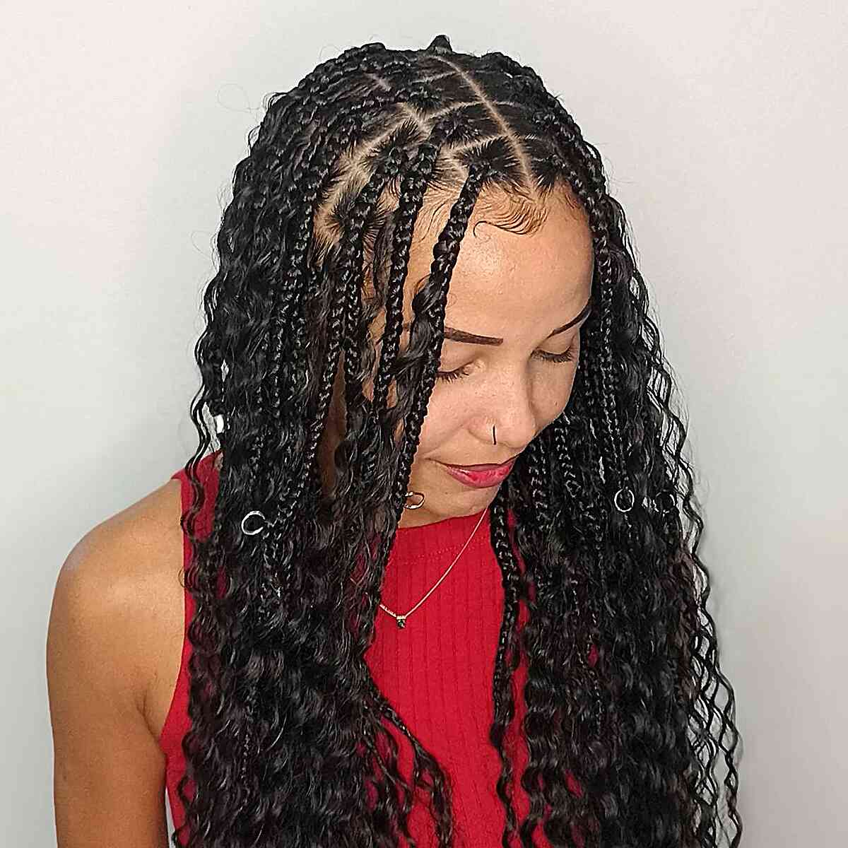 medium sized box braids with curls