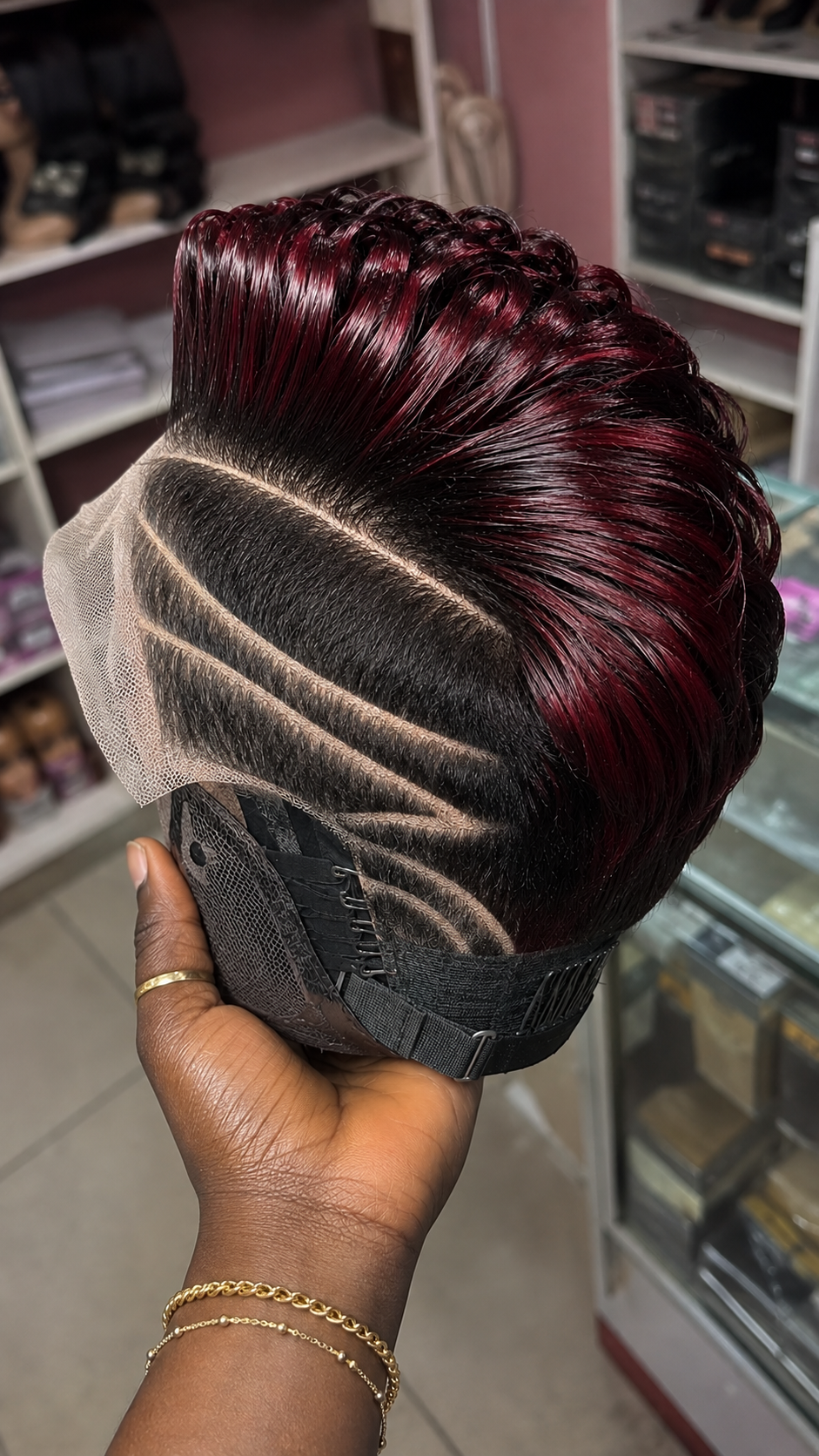 The Deep Merlot Surface Tipping On A Pompadour Pixie Wig Needs High-Contrast Roots To Show Its True Depth #StylistStudioMSCh The Deep Merlot Surface Tipping On A Pompadour Pixie Wig Needs High-Contrast Roots To Show Its True Depth #StylistStudioMSCh