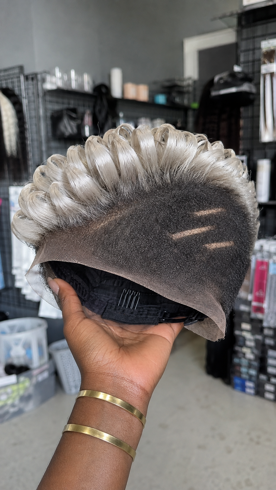 A Triple Horizontal Razor Channel Anchors An Icy Platinum Crest On A Contrast-Tapered Pixie Wig #haircutsforwomensh A Triple Horizontal Razor Channel Anchors An Icy Platinum Crest On A Contrast-Tapered Pixie Wig #haircutsforwomensh