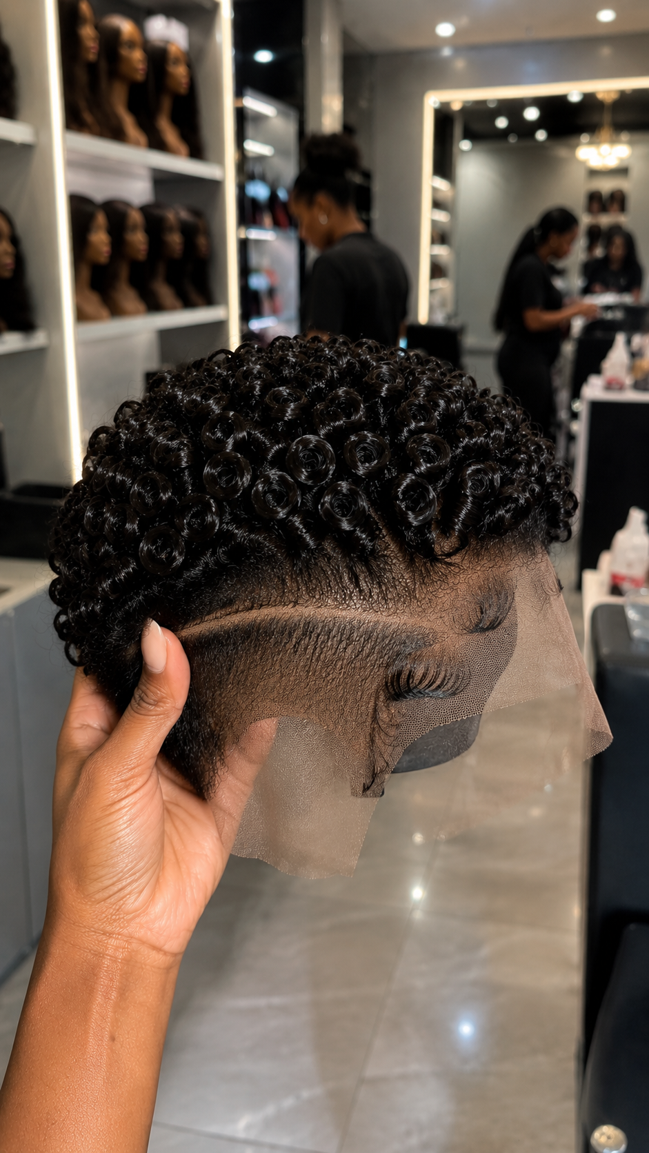 A Single Sweeping Razor Contour Sets The Horizon Across An Obsidian Rosette Pixie Wig Over A Precision Shadow Fade #afth