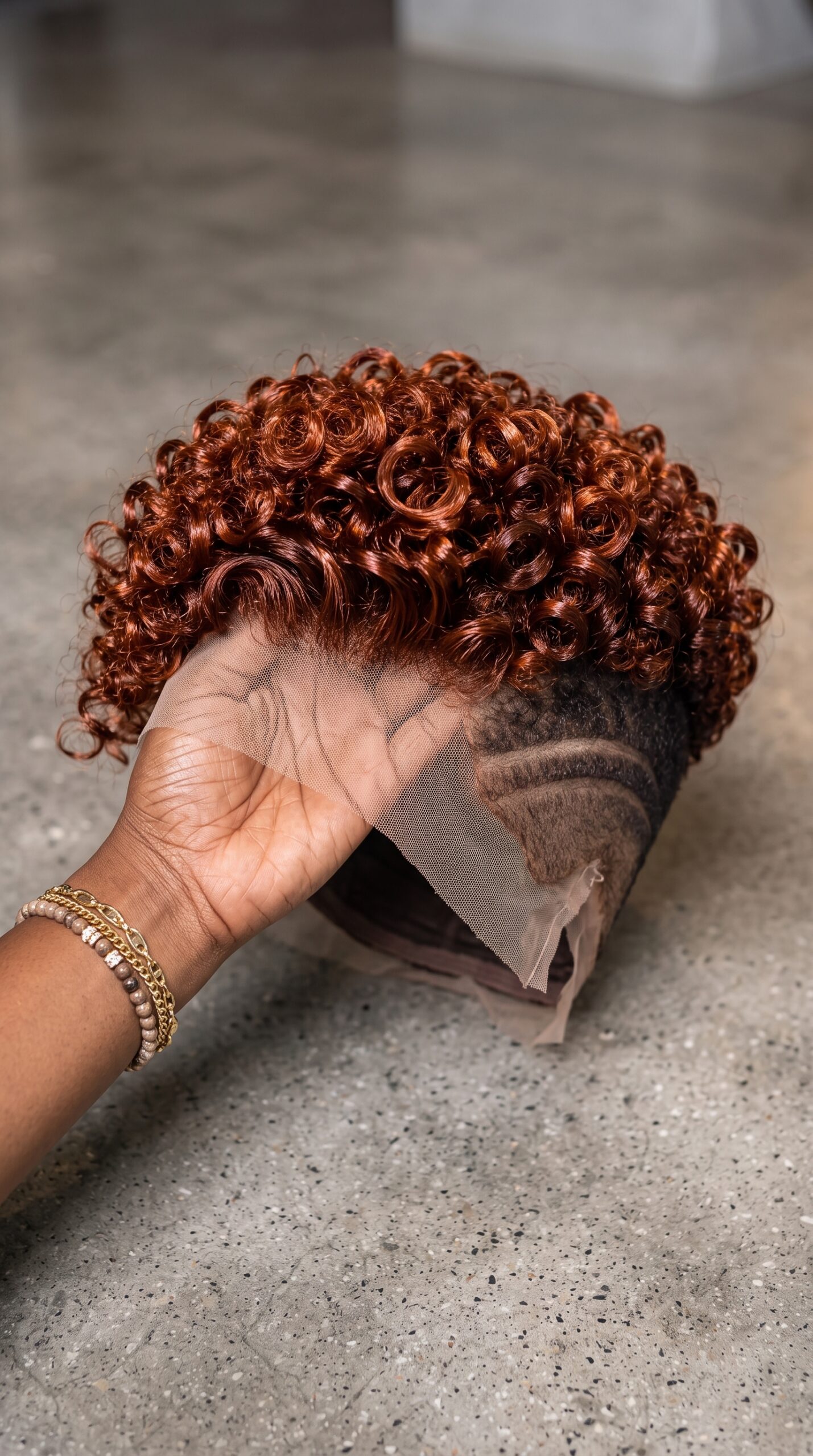 A Single Curved Razor Track Sets The Boundary For Warm Cinnamon Ringlets On A Tapered Pixie Wig #AfricanTrendyFashionSC
