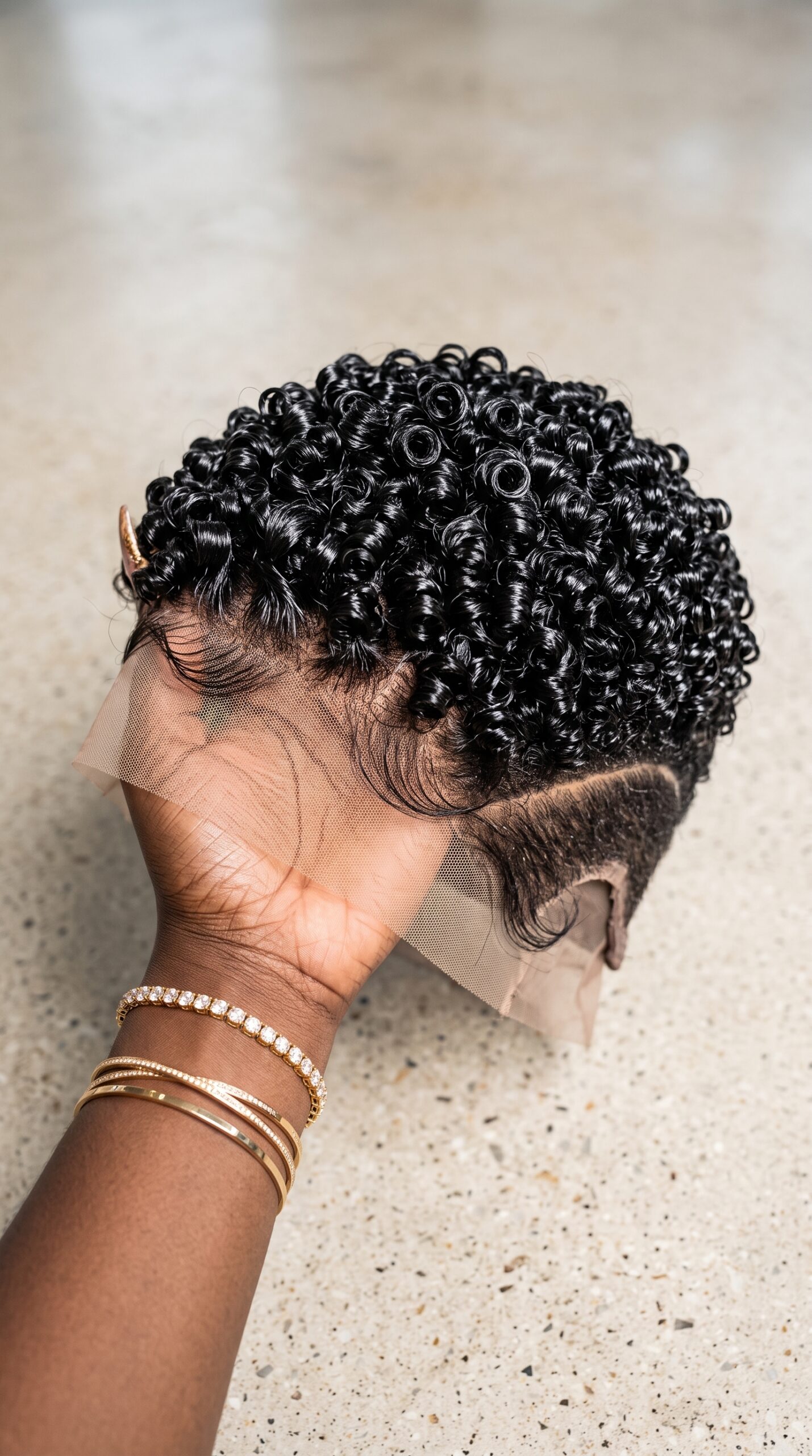 A Single Curved Razor Line Anchors The Temple Fade On A Tight Ringlet Pixie Wig #haircutsforwomensh
