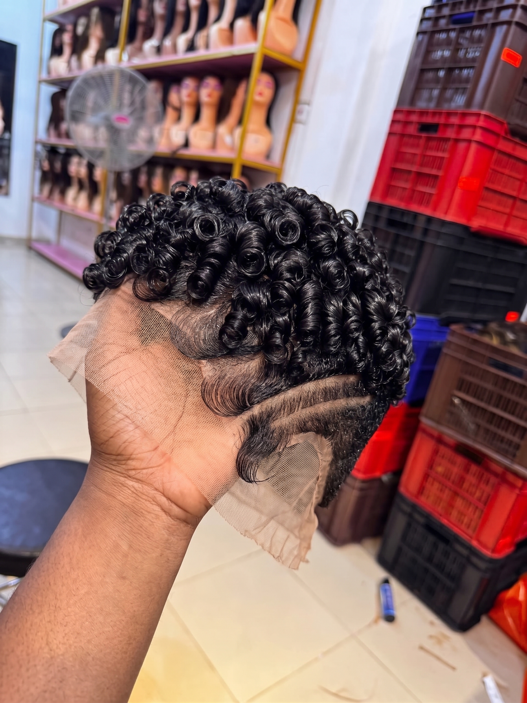 A Single Temple Carved Line Defines The Structural Boundary On A Jet-Black Ringlet Pixie Wig #naturalhair.hairstyles A Single Temple Carved Line Defines The Structural Boundary On A Jet-Black Ringlet Pixie Wig #naturalhair.hairstyles