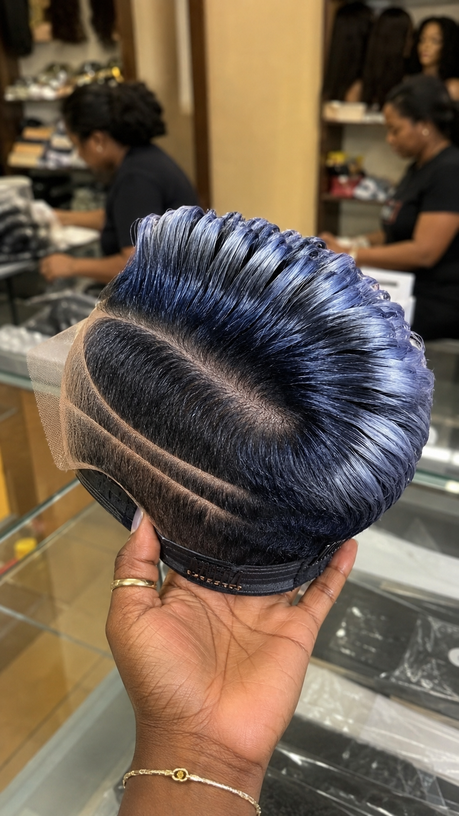 A Metallic Denim Blue Tipping Defines The Ridges Of A Sculpted Pompadour Pixie Wig #africanprintdesignersh A Metallic Denim Blue Tipping Defines The Ridges Of A Sculpted Pompadour Pixie Wig #africanprintdesignersh