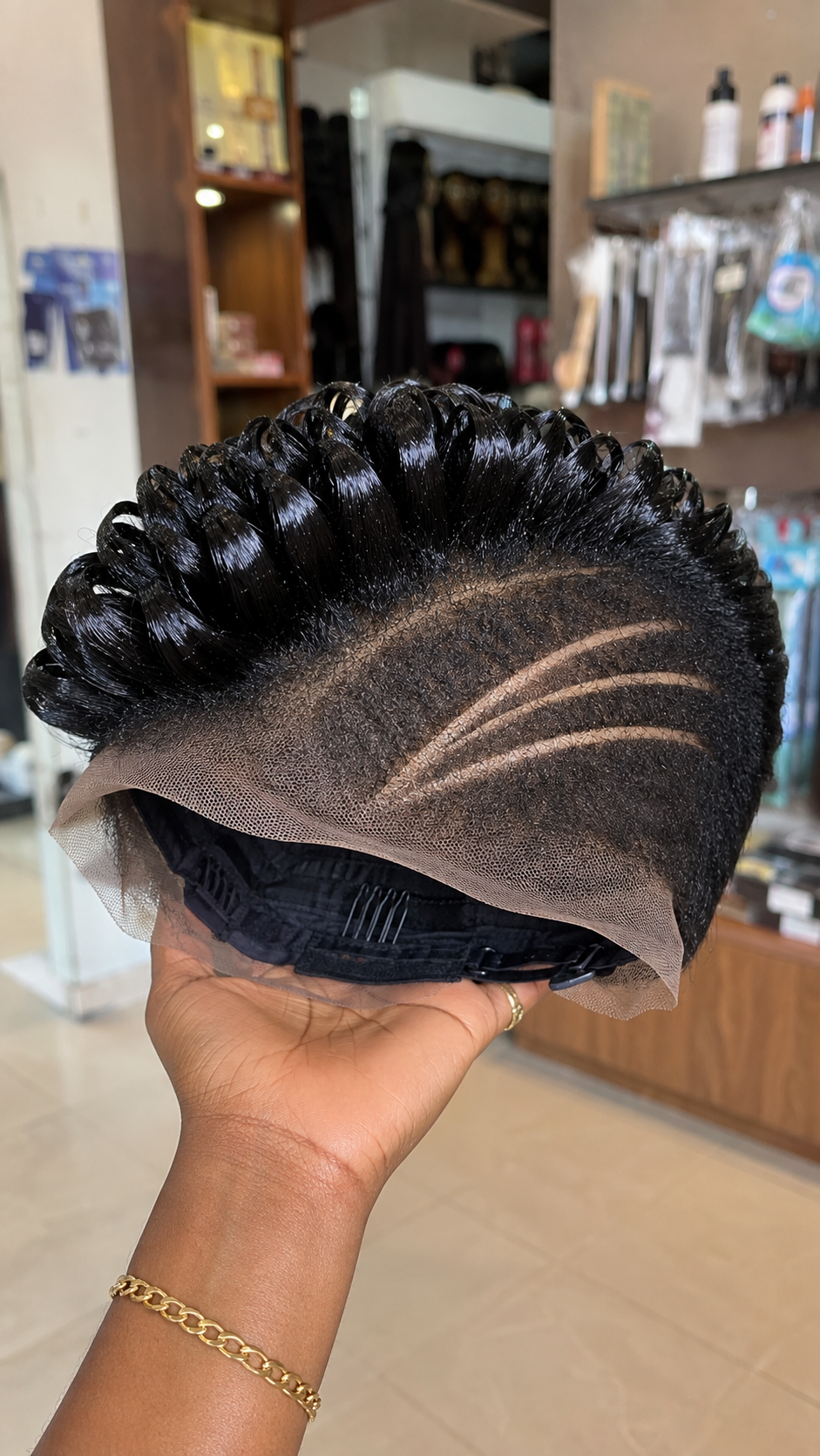 Triple Curved Claw Razor Channels Anchor A Precision Fade On A High-Gloss Coiled Pixie Wig #africanprintdesignersh Triple Curved Claw Razor Channels Anchor A Precision Fade On A High-Gloss Coiled Pixie Wig #africanprintdesignersh
