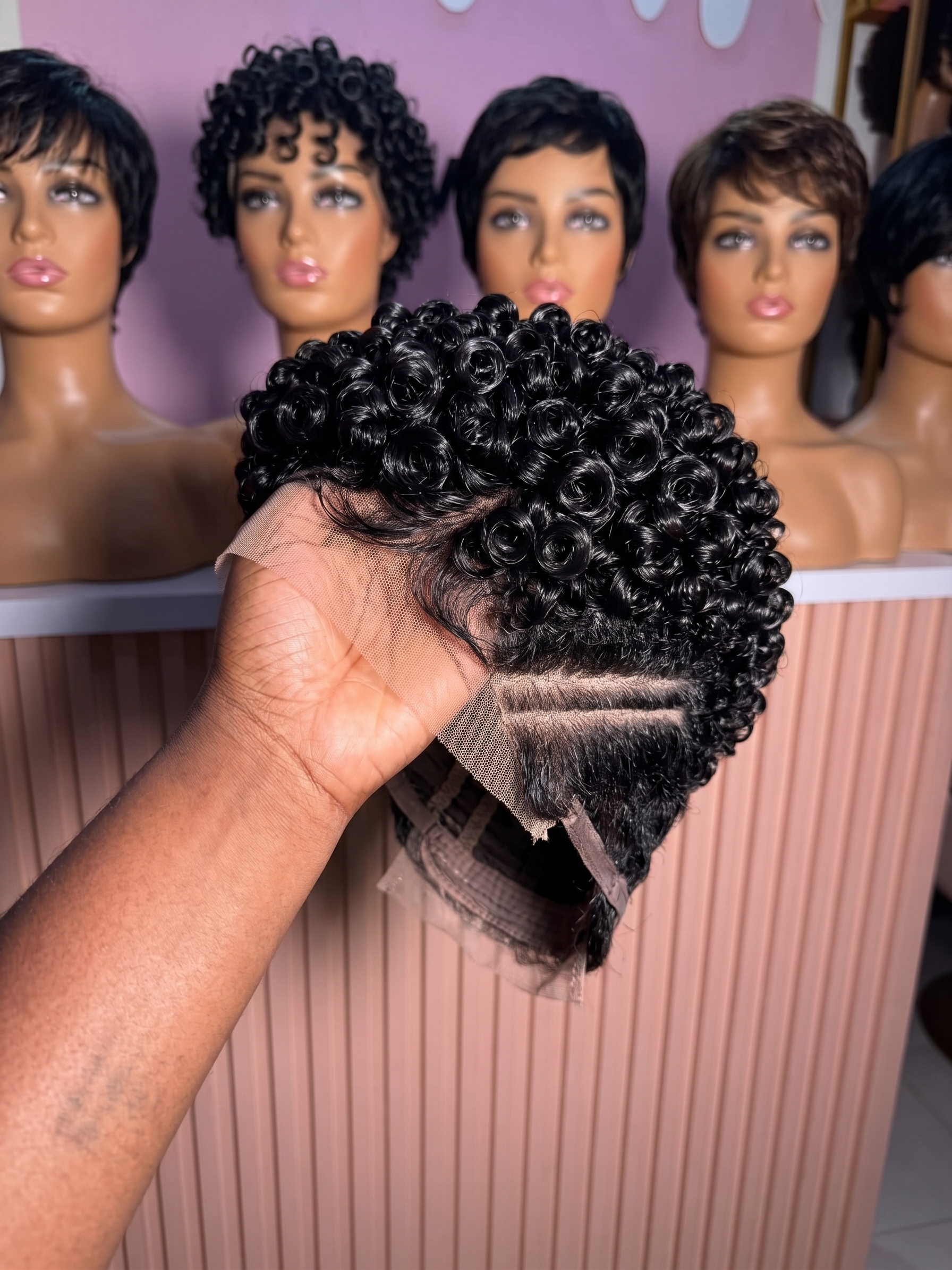 Two Razor Channels Separate Dense Crown Ringlets From A Low-Tapered Fade On A Jet-Black Pixie Wig #HairstylesforWomenSC