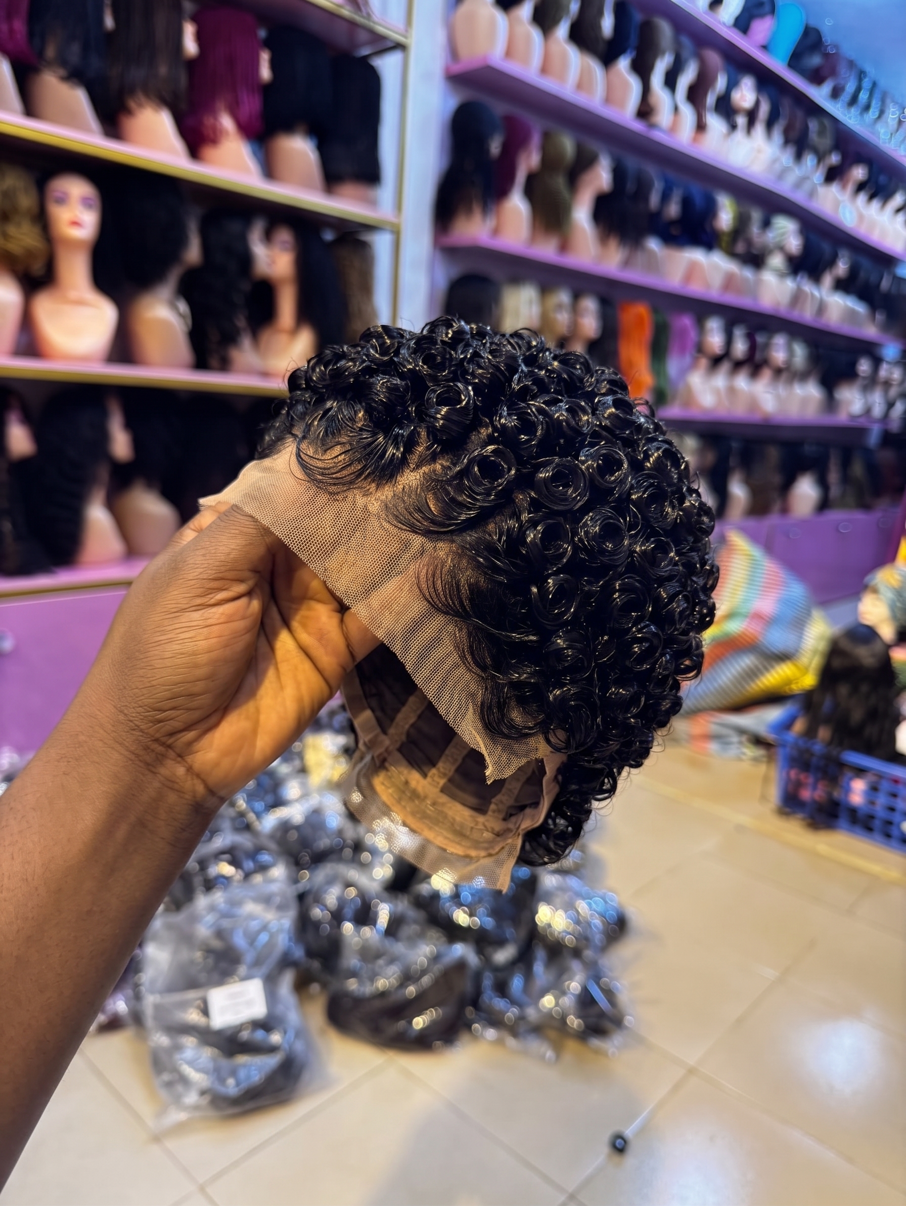 The Internal Cap Architecture On A Jet-Black Wet-Look Pin Curl Pixie Wig Dictates How The Frontal Mesh Melts #BestFashionDesignsSC