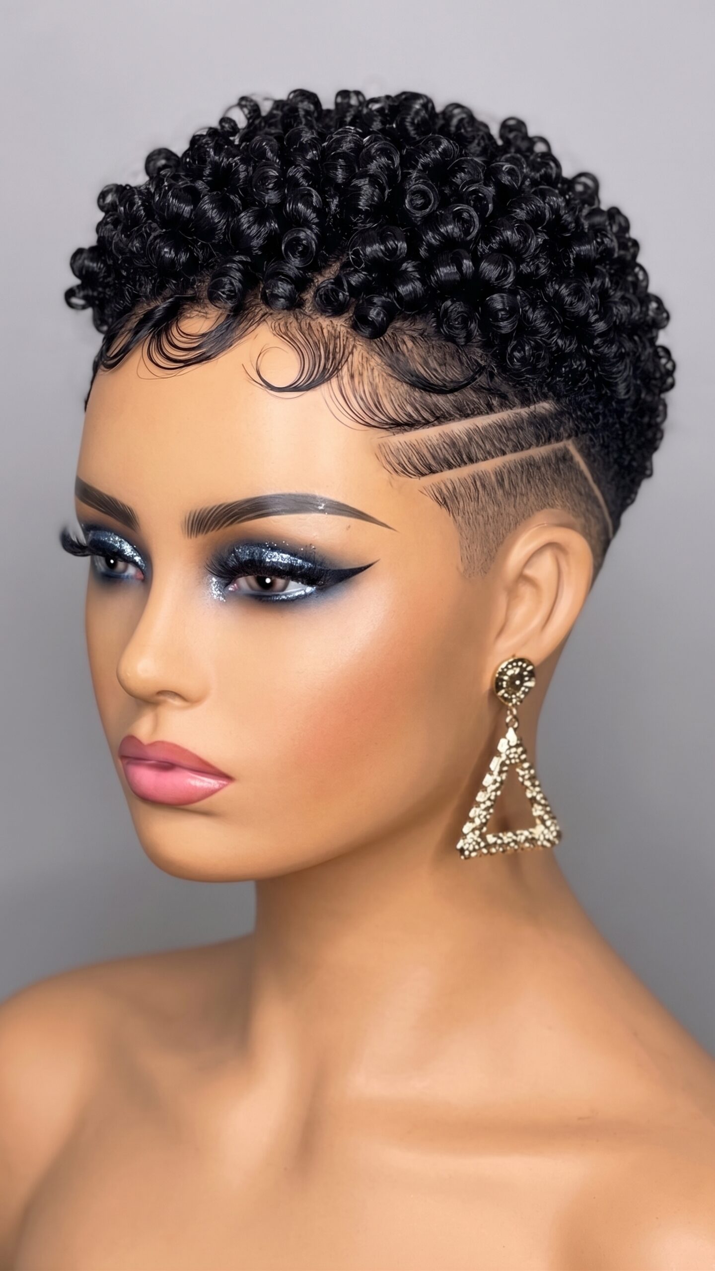 Jet Black Ringlet Pixie With Sculpted Finger Waves and Double Side Lines #HaircutStyleIdeas
