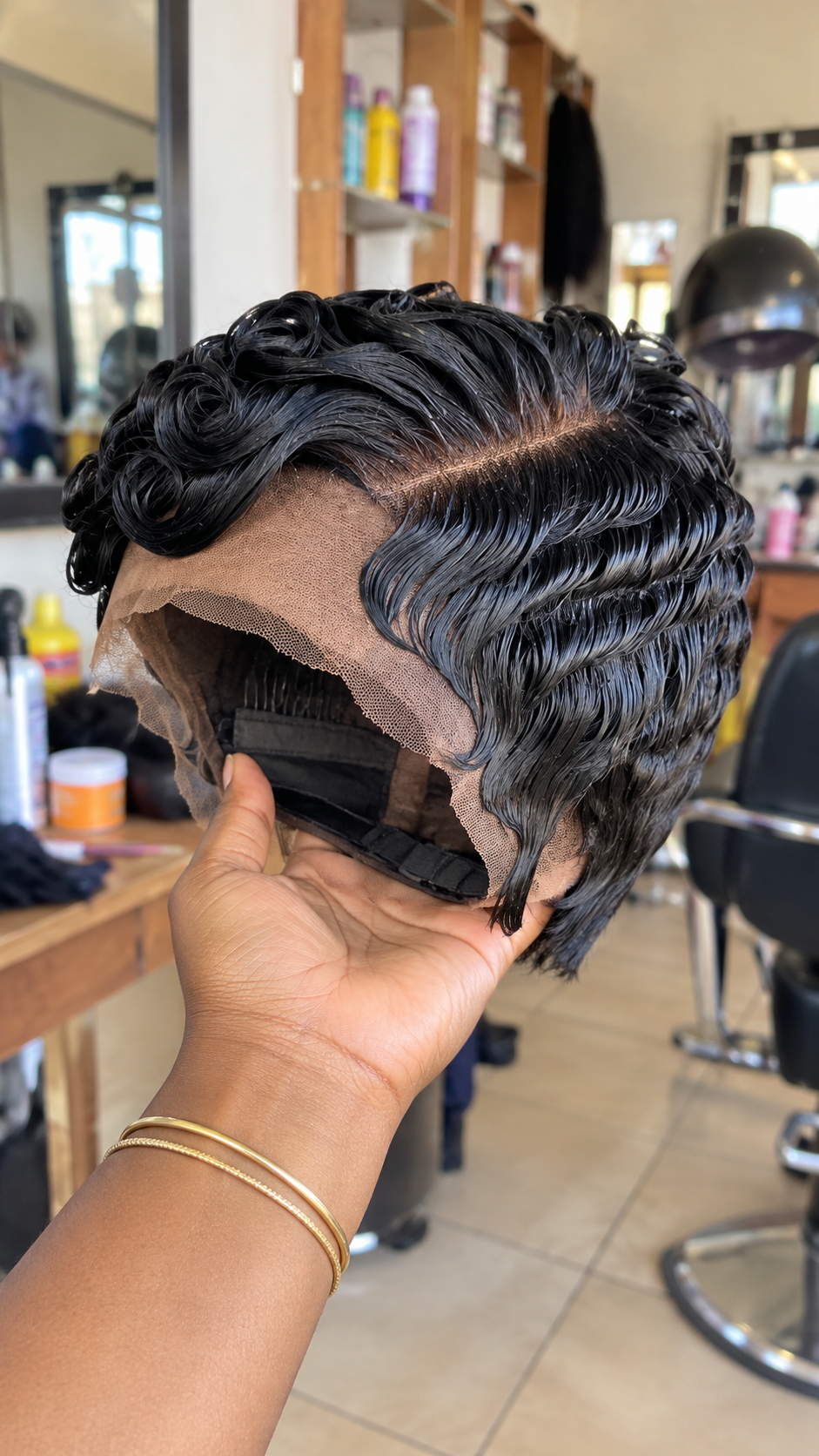 Jet Black Water Wave Pixie Wig With a Diagonal Side Part and Sculpted S-Curve Layers #bwi Jet Black Water Wave Pixie Wig With a Diagonal Side Part and Sculpted S-Curve Layers #bwi