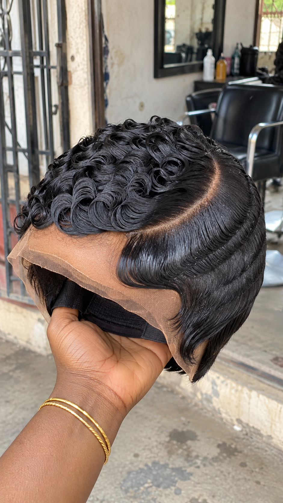 Midnight Black Marcel Wave Pixie Wig With a Sweeping Side Part and Sculpted Curled Fringe #bwi